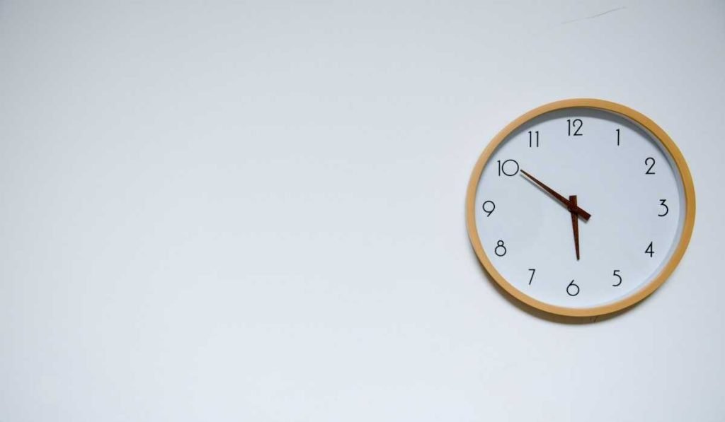 A clock hanging on a wall