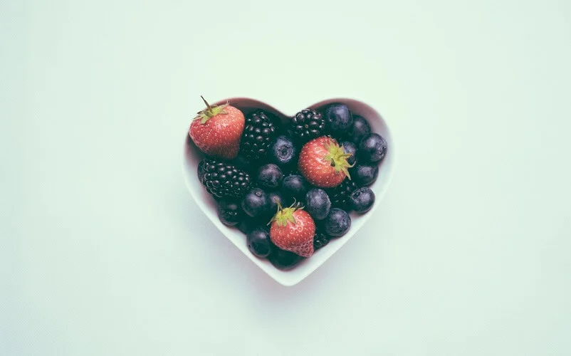 fruits in heart shaped bowl