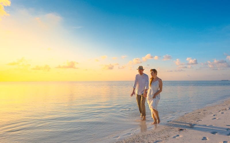 couple walking in the beach