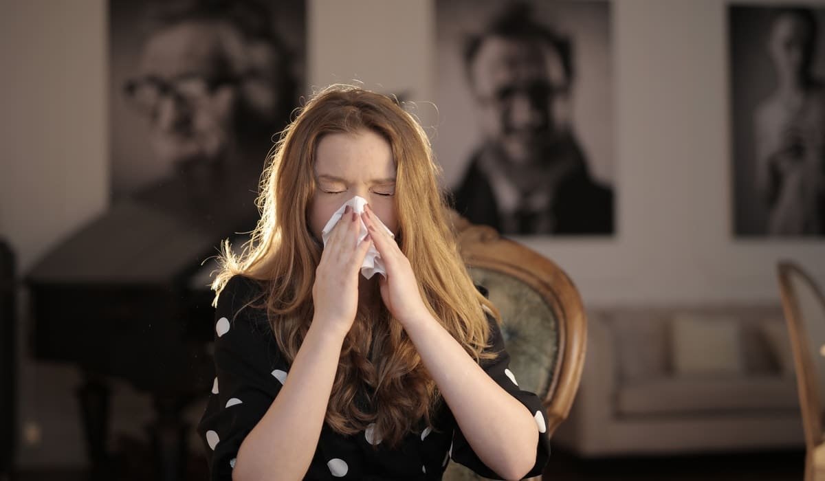 Woman Sneezing Best Foods for Viral Infections