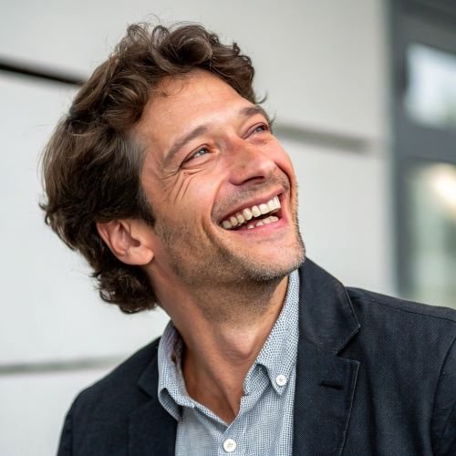 40-year old man laughing