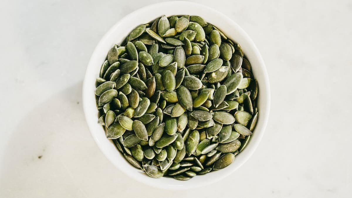 a bowl filled with pumpkin seeds