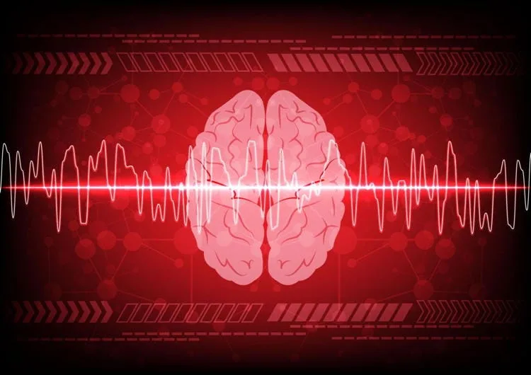 A Brain in red depicting that is under red light therapy