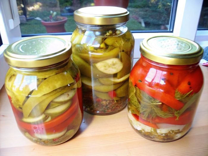 3 Jars with vinegar peppers